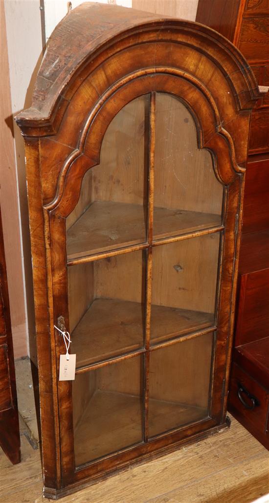 A 1920s Queen Anne revival walnut hanging corner cabinet W.60cm